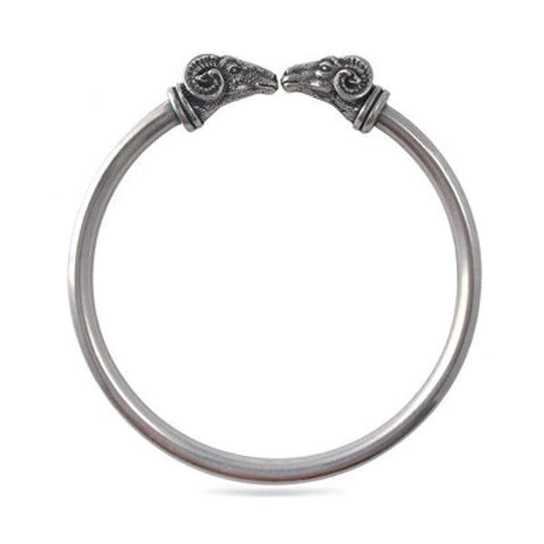 Silver bangle with rams head on each end 
