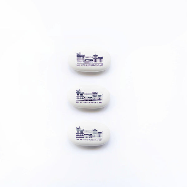 round white eraser with SAMA building imprinted